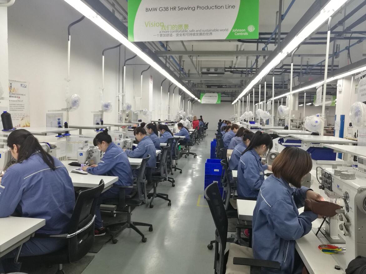 脚踏实地,只争朝夕:金杯江森公司缝纫车间女职